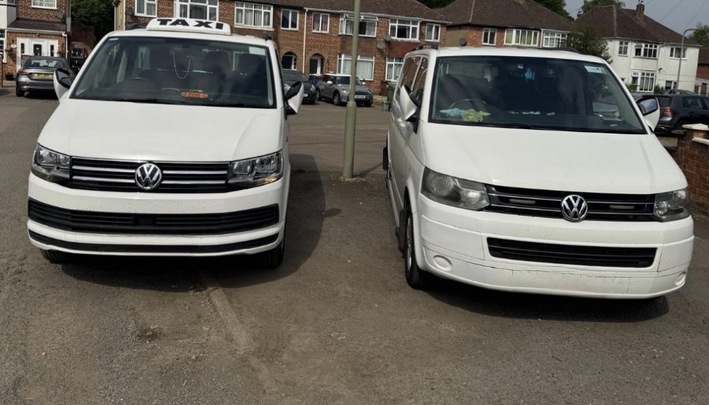 Header photo showing our taxis parked side by side